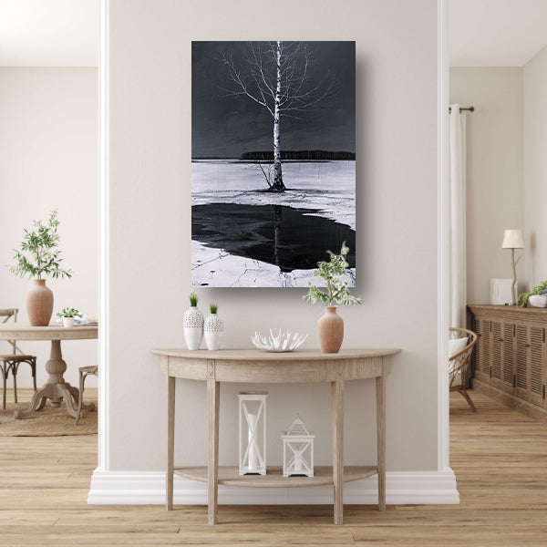 Eenzame boom bij bevroren meer canvas