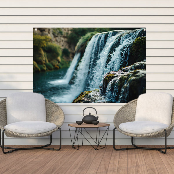 Waterval Stroomt Over Rotsen in Natuurlijke Omgeving tuinposter