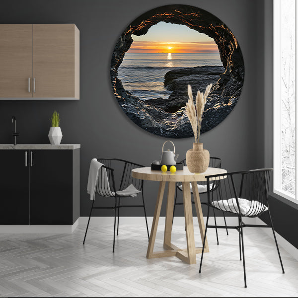 Zonsondergang aan Zee door Stenen Grot aluminium muurcirkel