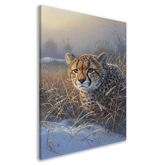 Jonge cheeta in sneeuw bedekt gras canvas