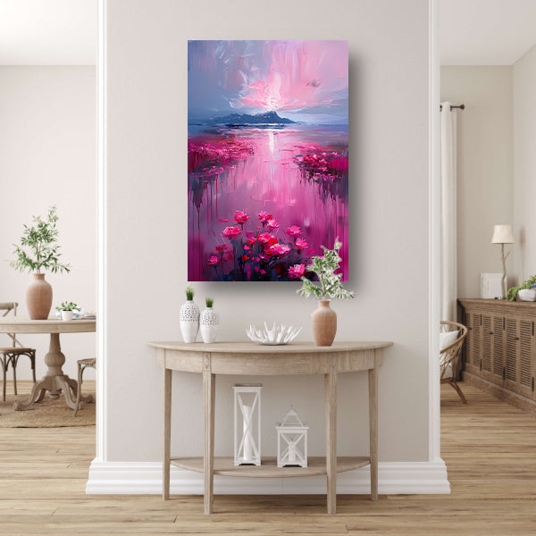 Roze zonsondergang en bloemen aan de waterkant canvas