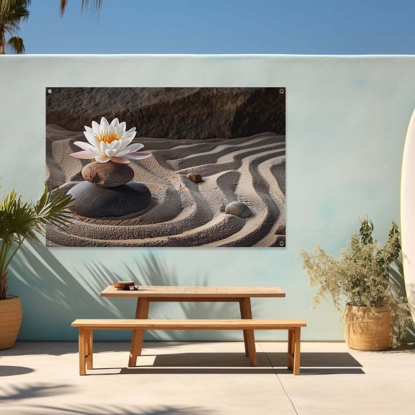 Zen-bloem op stenen in een zandtuin tuinposter