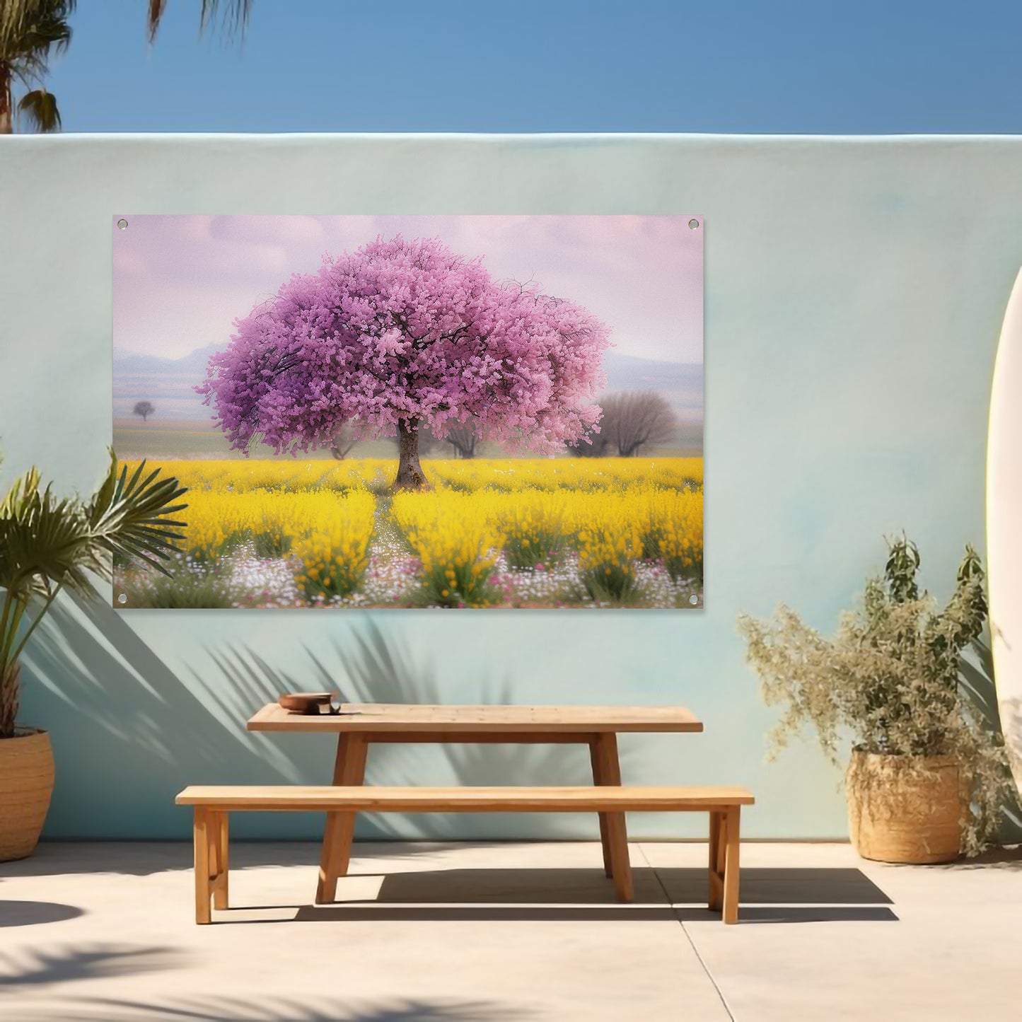 Bloeiende boom in kleurrijk bloemenveld tuinposter