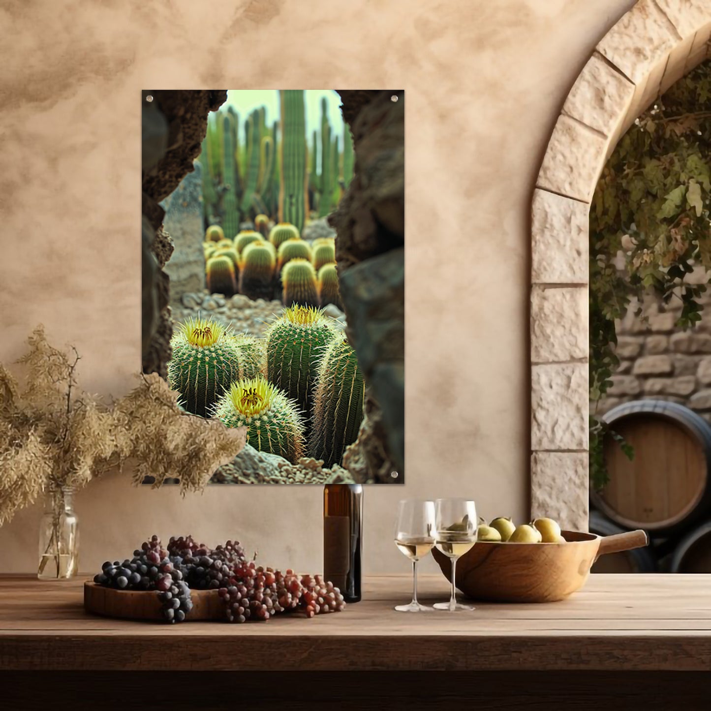 Cactussen in bloei achter rotsformatie tuinposter