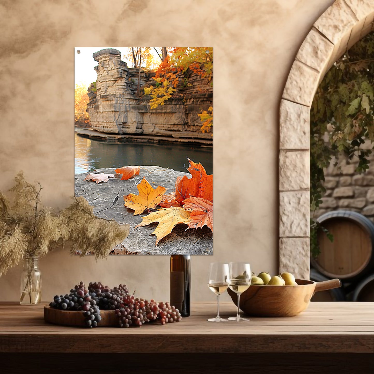 Herfstbladeren langs de rivier bij rotsen tuinposter