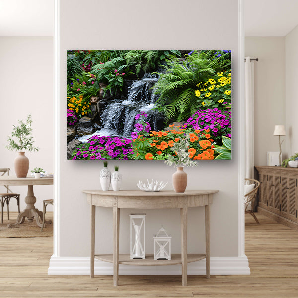 Waterval in kleurrijke bloementuin canvas