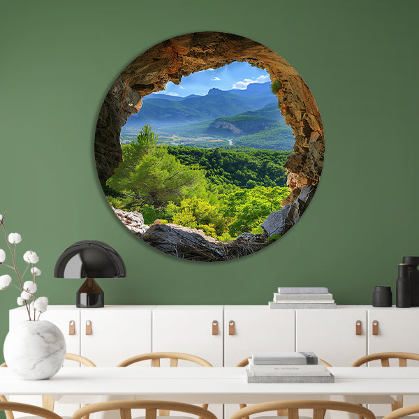 Berglandschap gezien vanuit een grot aluminium muurcirkel