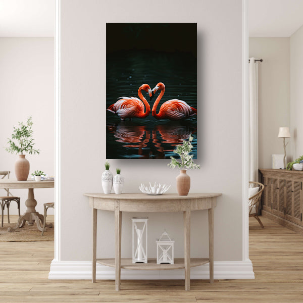 Twee felgekleurde flamingo’s in donkere water canvas met baklijst