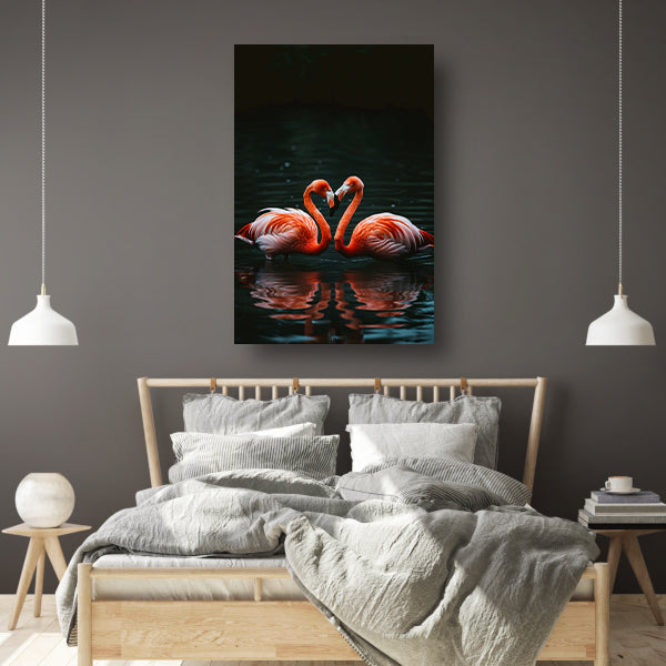 Twee felgekleurde flamingo’s in donkere water canvas met baklijst