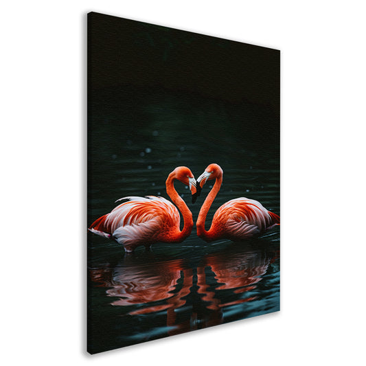 Twee felgekleurde flamingo’s in donkere water canvas