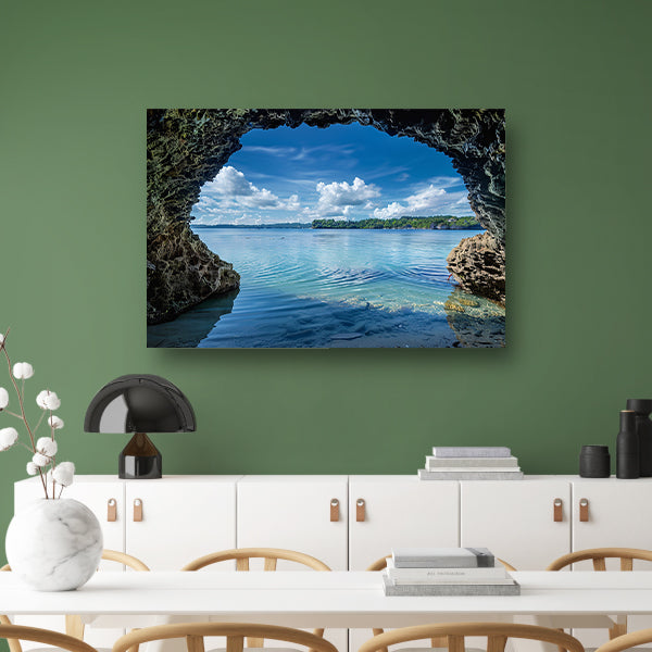 Zeezicht vanuit een grot met turquoise water poster
