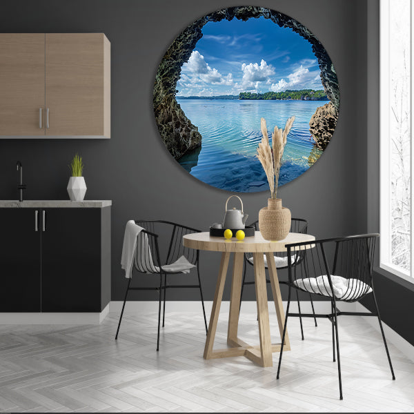 Zeezicht vanuit een grot met turquoise water aluminium muurcirkel