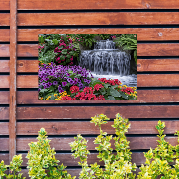 Kleurrijke bloementuin met serene waterval tuinposter