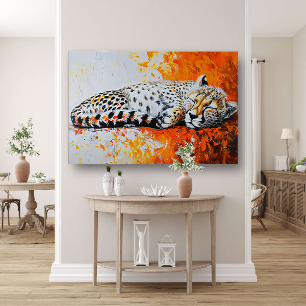 Slapende cheeta met kleurrijke oranje achtergrond canvas