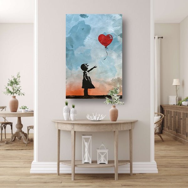 Silhouet van meisje met rode hartvormige ballon canvas