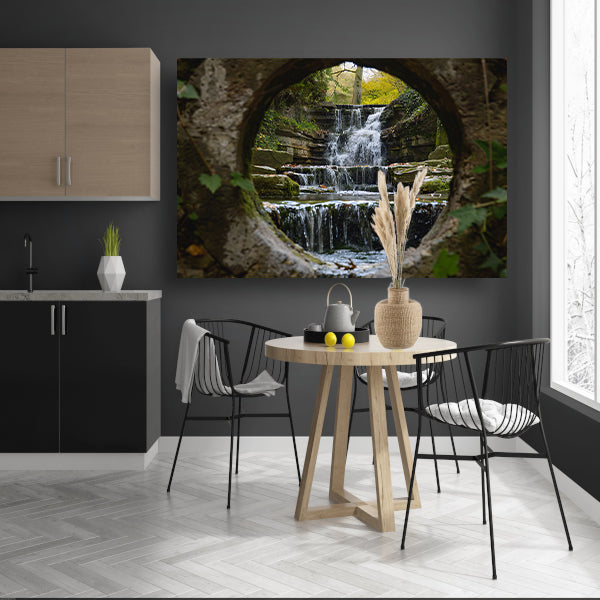 Waterval door een stenen opening gezien poster
