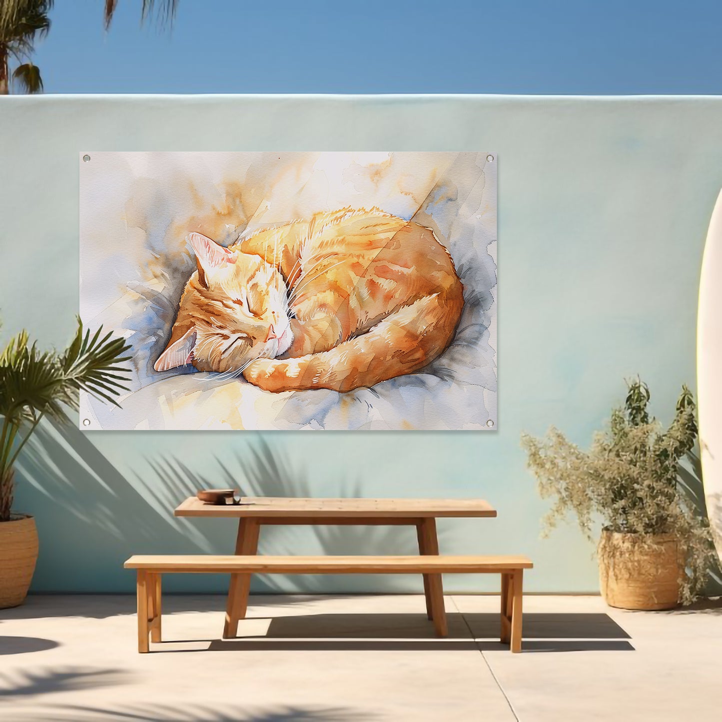 Slapende kat op een zacht kussen tuinposter
