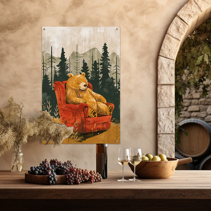 Bruine beer in rode fauteuil in bos tuinposter