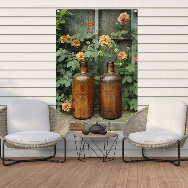 Twee oude flessen met bloemen tuinposter