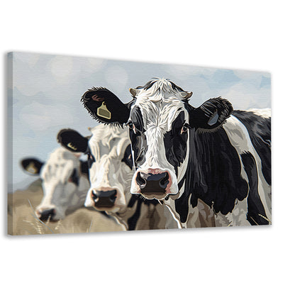 Close-up van zwart-witte koeien in landschap canvas