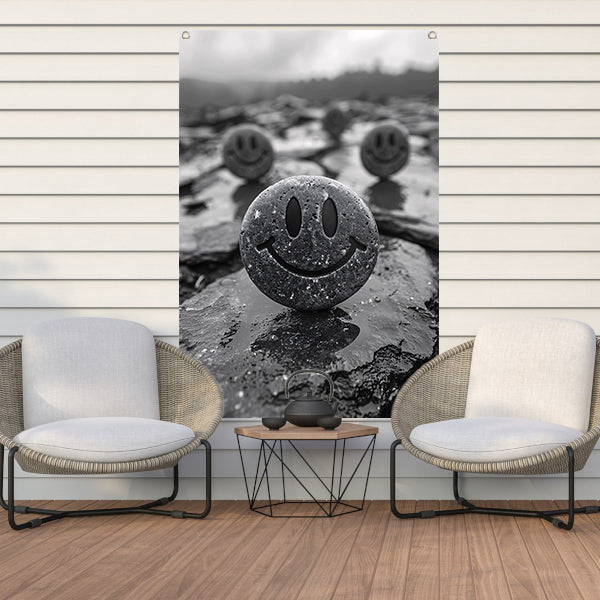 Drie Glimlachende Stenen op een Grijze Dag tuinposter