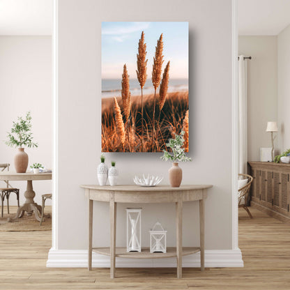 Gouden Grashalmen bij Zee in Zonsondergang poster