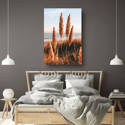 Gouden Grashalmen bij Zee in Zonsondergang poster