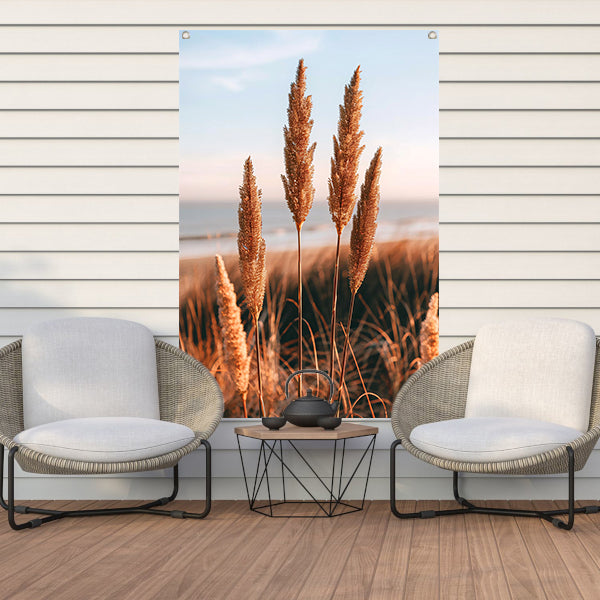 Gouden Grashalmen bij Zee in Zonsondergang tuinposter