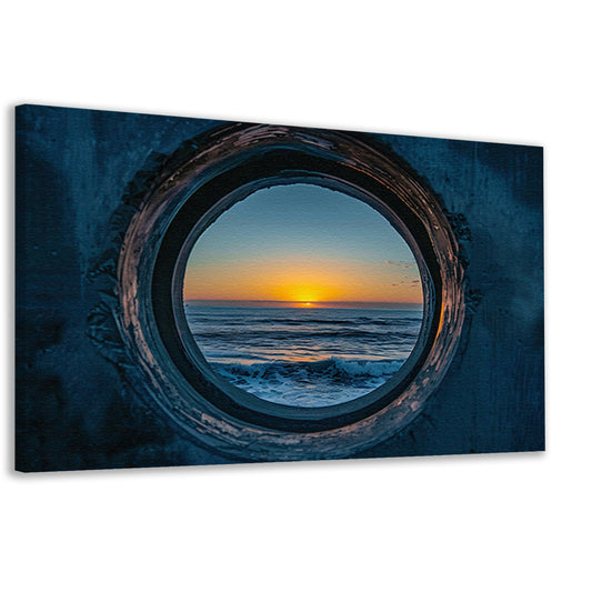 Zonsondergang door een ronde opening aan zee canvas