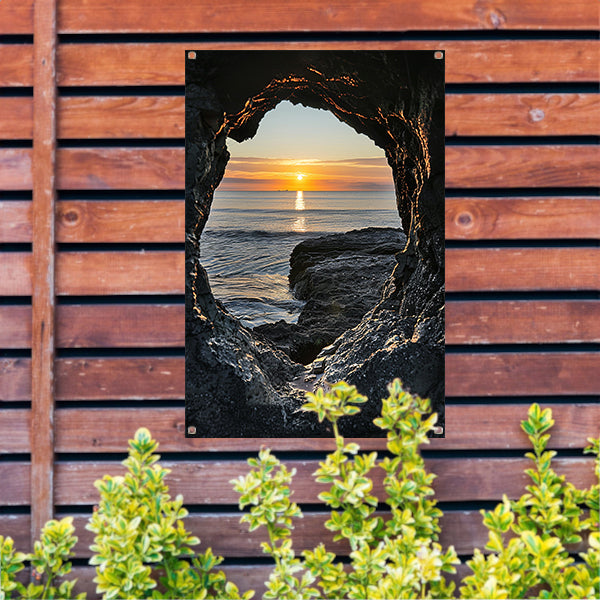 Zonsondergang aan Zee door Stenen Grot tuinposter