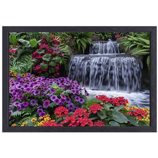 Kleurrijke bloementuin met serene waterval canvas met baklijst