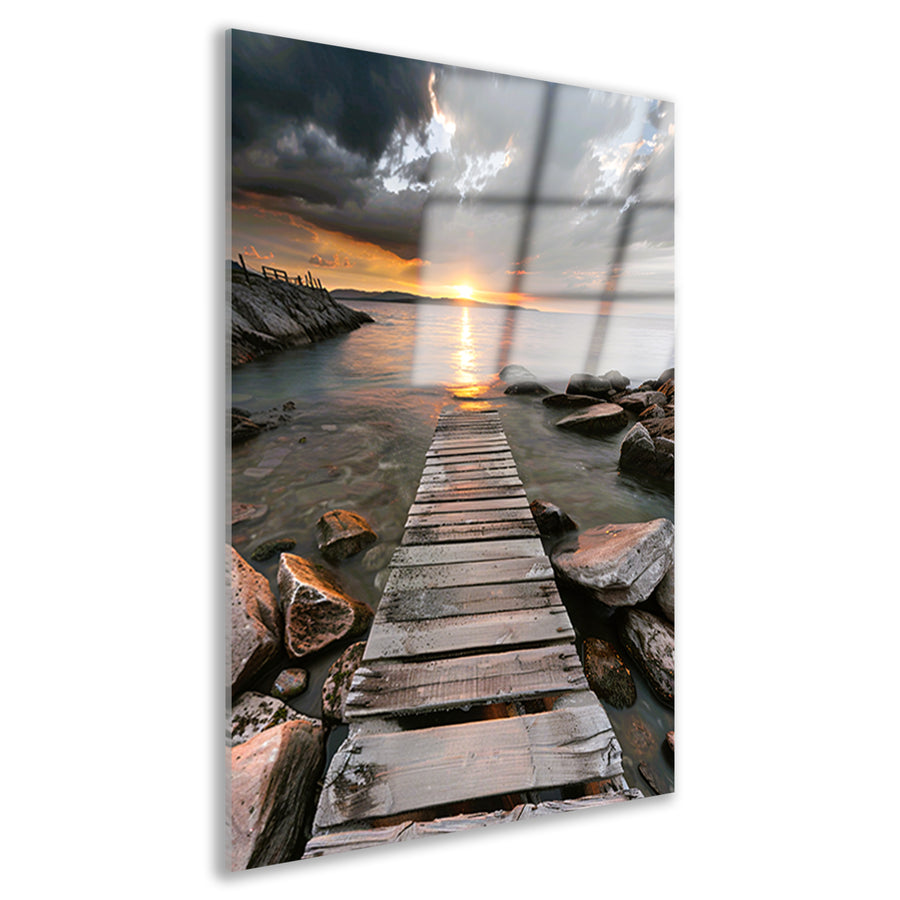 Gouden zonsondergang met dramatische wolken en steiger acrylglas