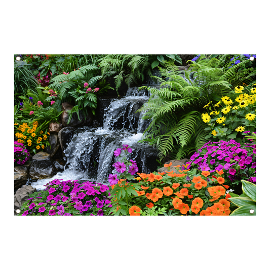 Waterval in kleurrijke bloementuin tuinposter