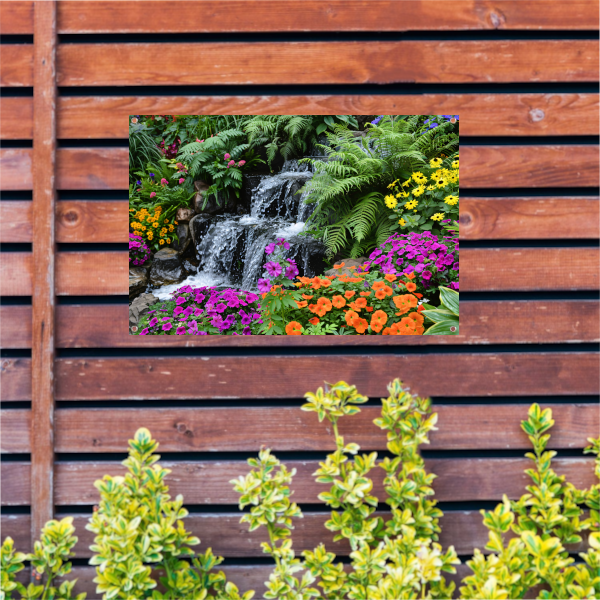 Waterval in kleurrijke bloementuin tuinposter