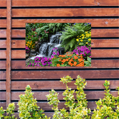 Waterval in kleurrijke bloementuin tuinposter