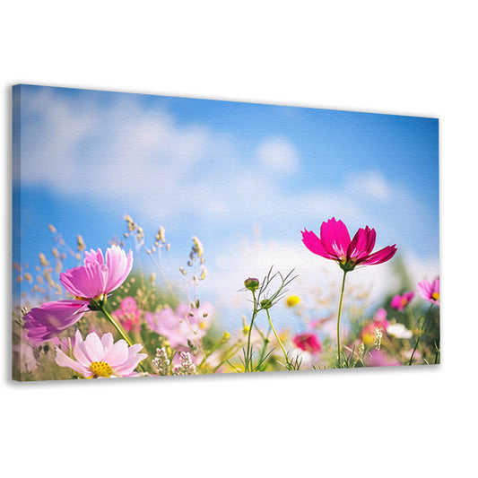 Heldere bloemen tegen een blauwe hemel   canvas