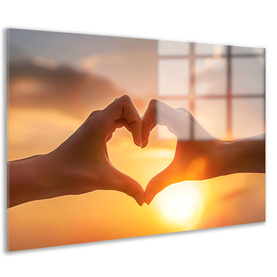 Handen vormen hart bij zonsondergang acrylglas