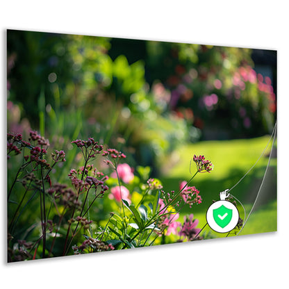 Levendige bloemen in een zonovergoten tuin poster