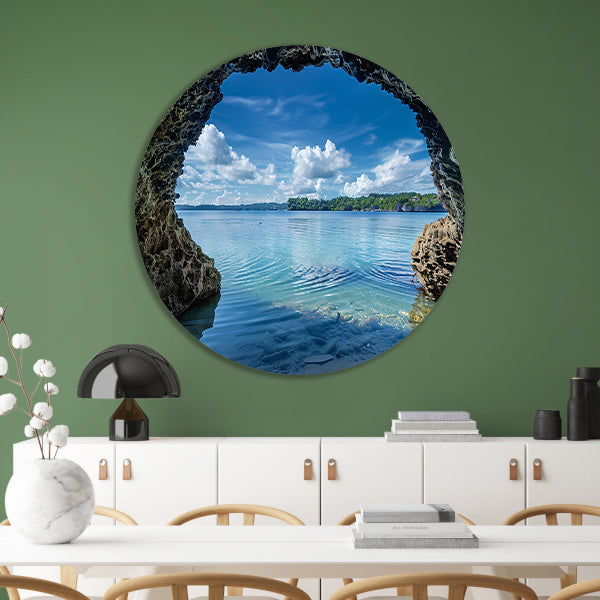 Zeezicht vanuit een grot met turquoise water aluminium muurcirkel
