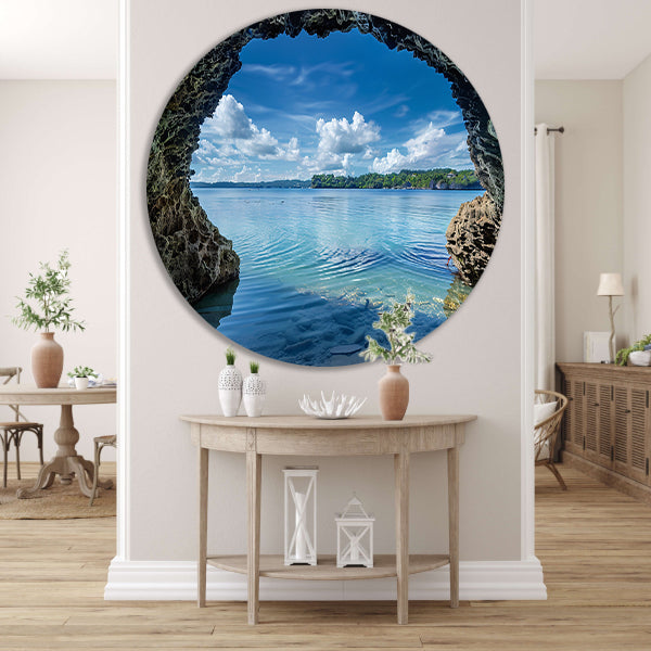 Zeezicht vanuit een grot met turquoise water aluminium muurcirkel
