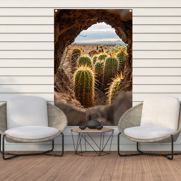 Cactussen door een natuurlijk venster tuinposter