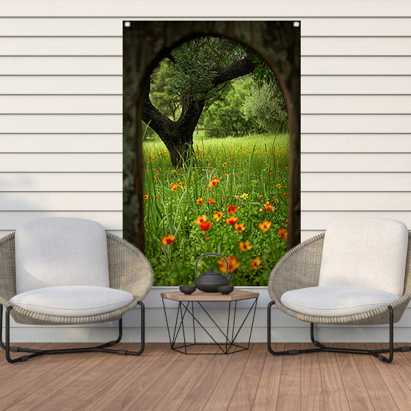 Bloemenweide met boom in boog tuinposter