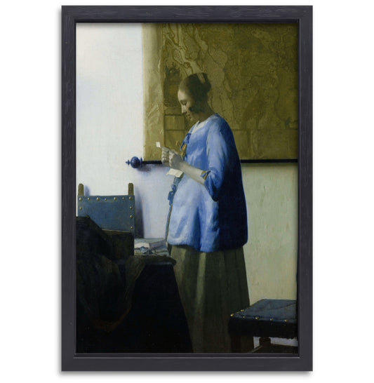 Vrouw in het blauw die een brief leest - Johannes Vermeer canvas met baklijst