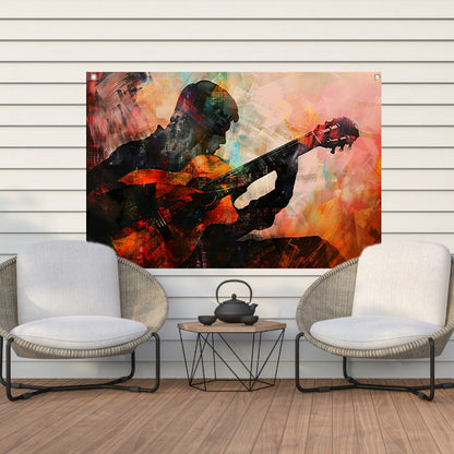 Abstracte silhouet van gitarist in kleuren   tuinposter