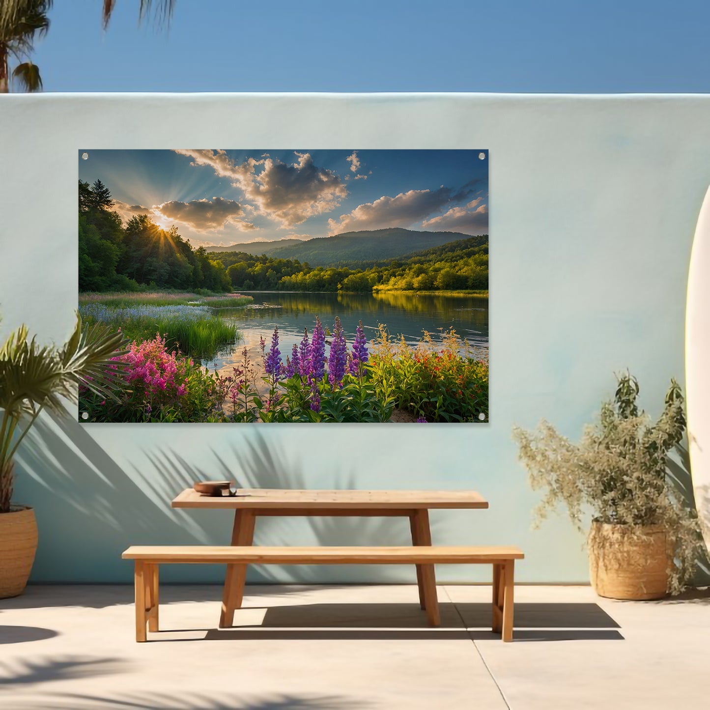 Zonsondergang over bloemenveld en meer tuinposter